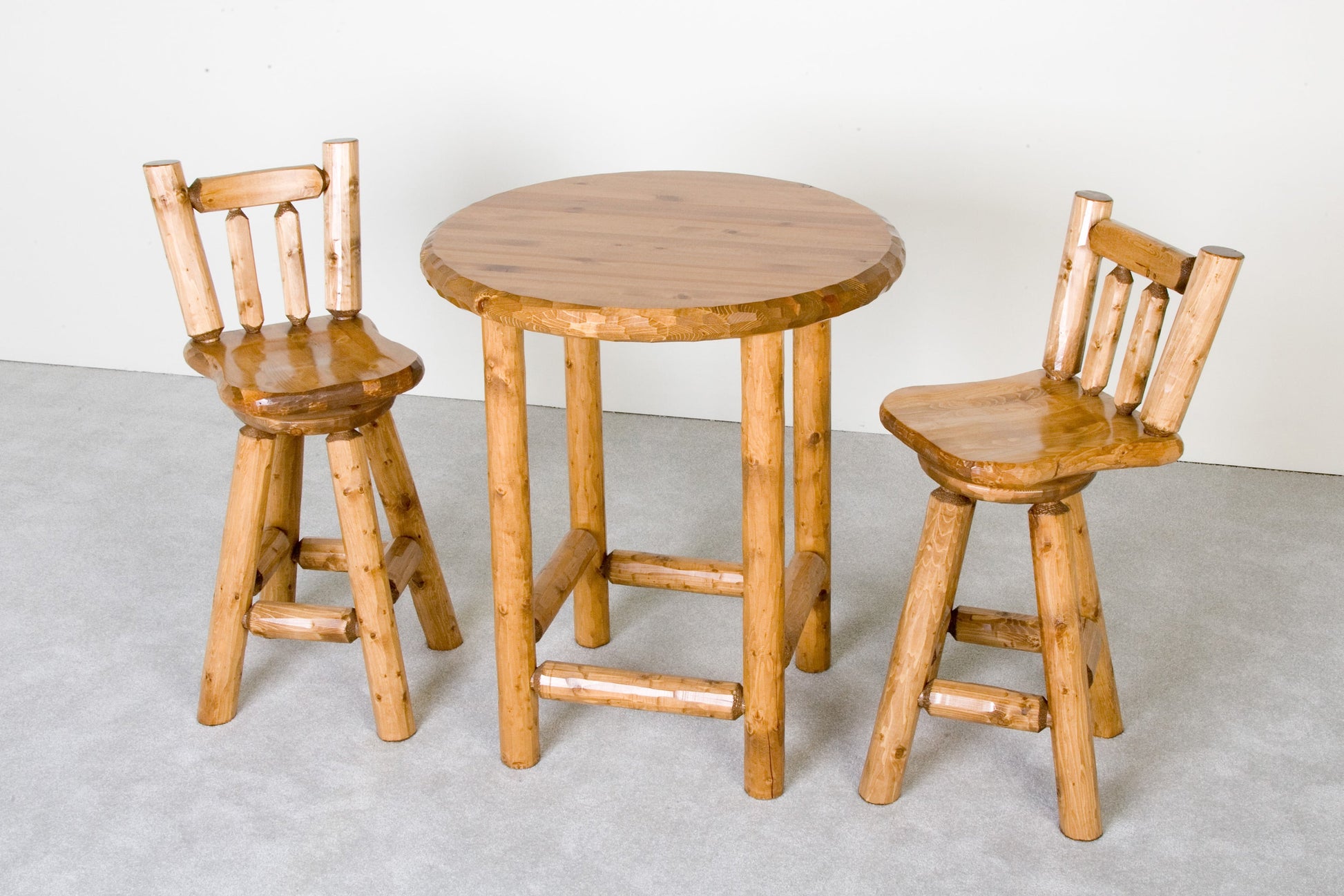 Log Pub Table alongside our matching Log Bar Stools in Honey Pine Finish